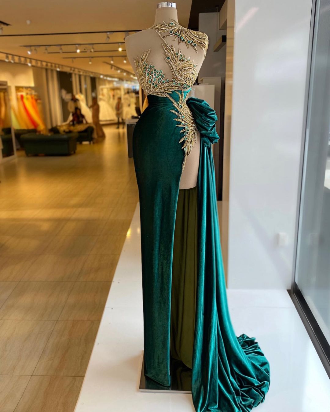 valdrin sahiti emerald green dress Emerald Green Sequin Gown with Crisscross Bodice – VALDRIN SAHITI main image 1