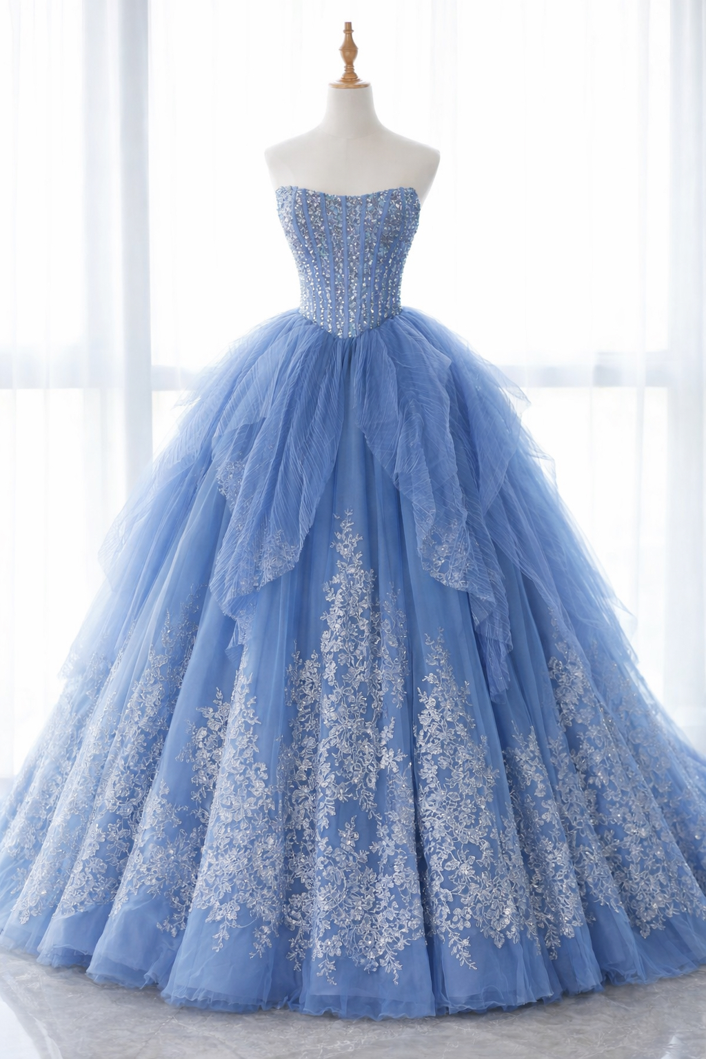 Dusty Blue Strapless Beaded Corset Ball Gown With Layered Tulle Skirt And Floral Lace Applique Dusty Blue Strapless Beaded Corset Ball Gown With Layered Tulle Skirt And Floral Lace Applique